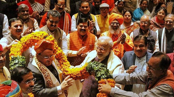 BJP president J P Nadda being felicitated by Narendra Modi and other BJP leaders at the party's parliamentary meeting in New Delhi