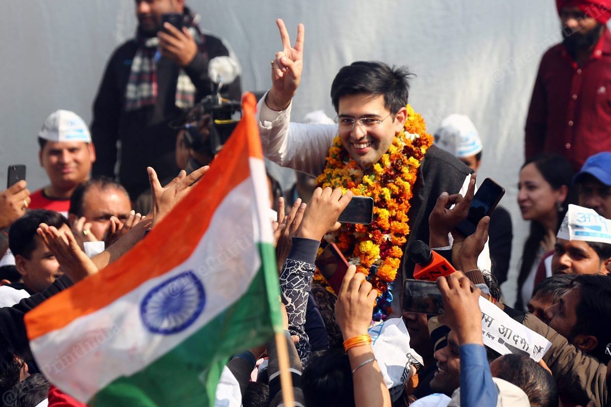 Newly elected MLA Raghav Chadha shows victory sign | Photo: Suraj Singh Bisht | ThePrint