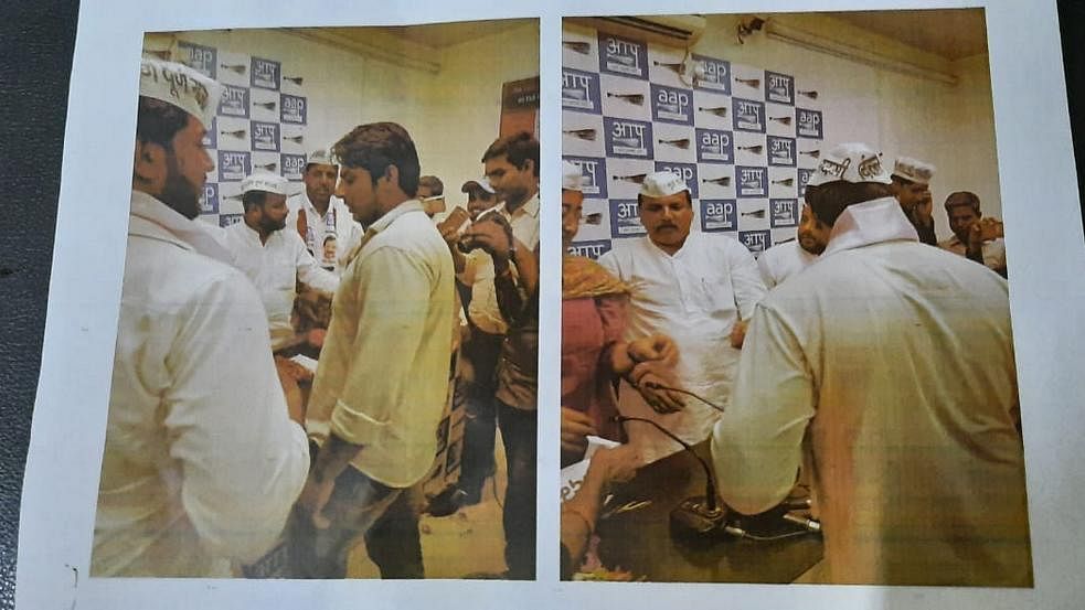 One of the photographs of Kapil Baisala with AAP leaders that police claim they retrieved from his phone | Delhi Police