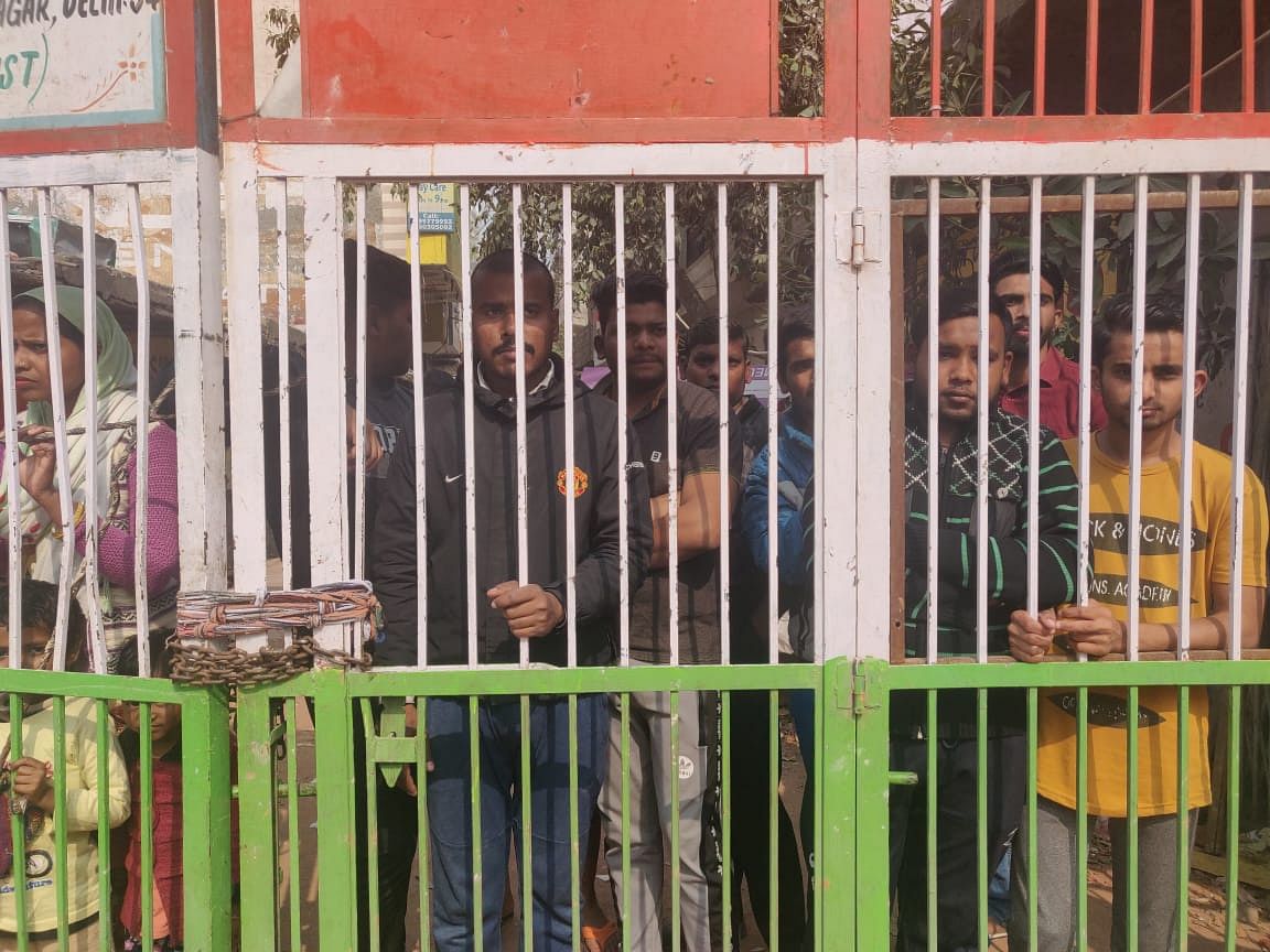 The Hindu community that lives across Hussain's home has locked the gates from inside | Photo: Fatima Khan | ThePrint