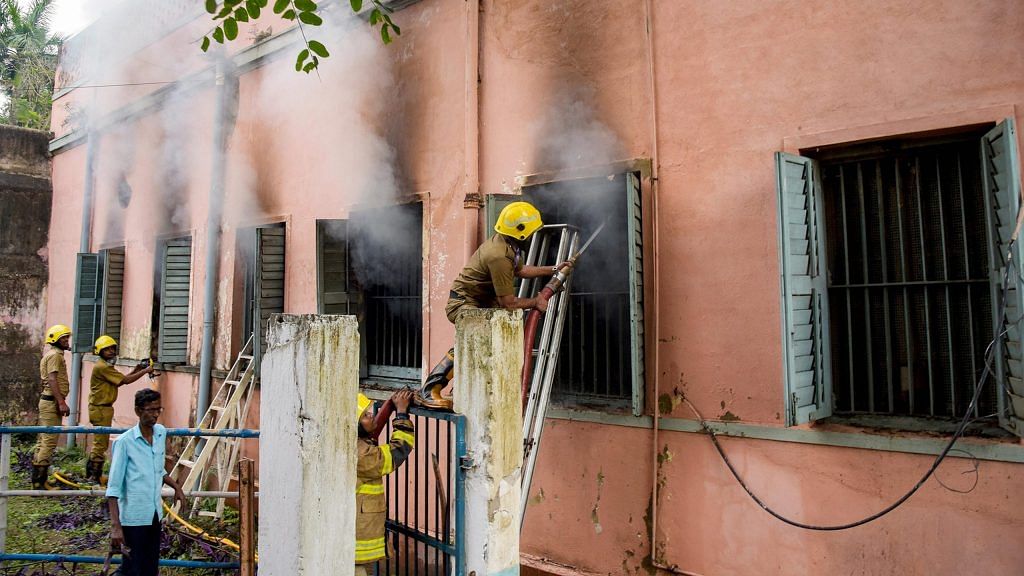 Firefighters attempt to douse fire at Dum Dum Central Jail in Kolkata during a clash between inmates | PTI
