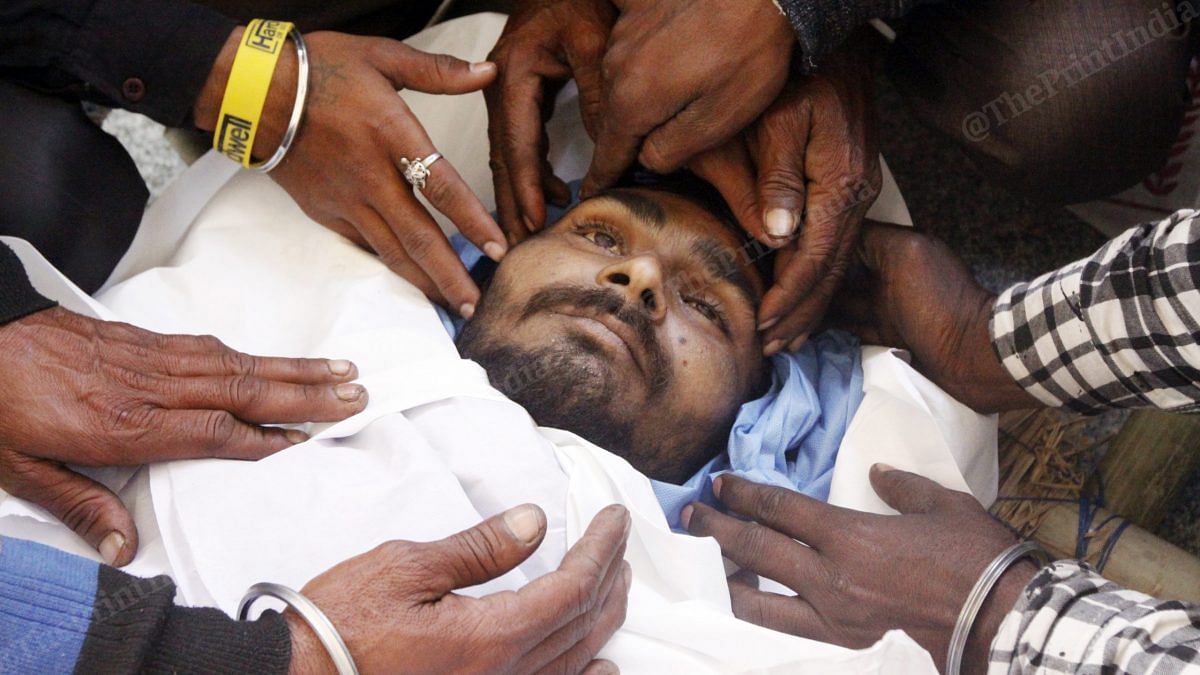 Prem Singh's body was brought to his home in Brijpuri, Yamuna Vihar | Photo: Praveen Jain | ThePrint