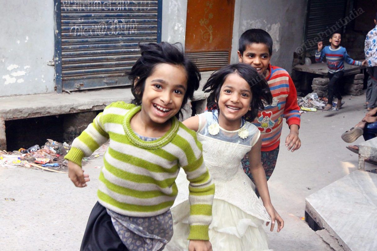 Children playing outside a shelter home in Babu Nagar | Photo: Praveen Jain | ThePrint