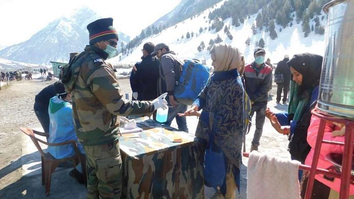 Army personnel offer sanitisers to civilians stranded at Gurez | Northern Command of the Indian Army | Twitter