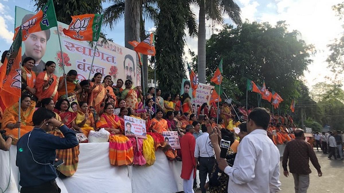 BJP workers gather at the party's MP headquarters in Bhopal to welcome Jyotiraditya Scindia | Photo: Ruhi Tewari | ThePrint