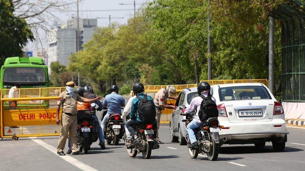 Only employees engaged in 'essential services' are allowed to be on the roads during the 21-day coronavirus lockdown in India | Photo: Suraj Singh Bisht | ThePrint