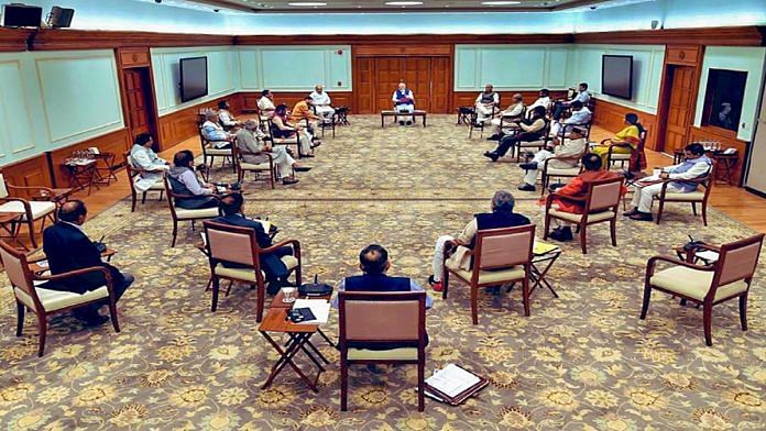 A photo from Wednesday's cabinet meeting held by PM Narendra Modi in which ministers, due to coronavirus, sit at a distance from each other to avoid close contact | Amit Shah | Twitter