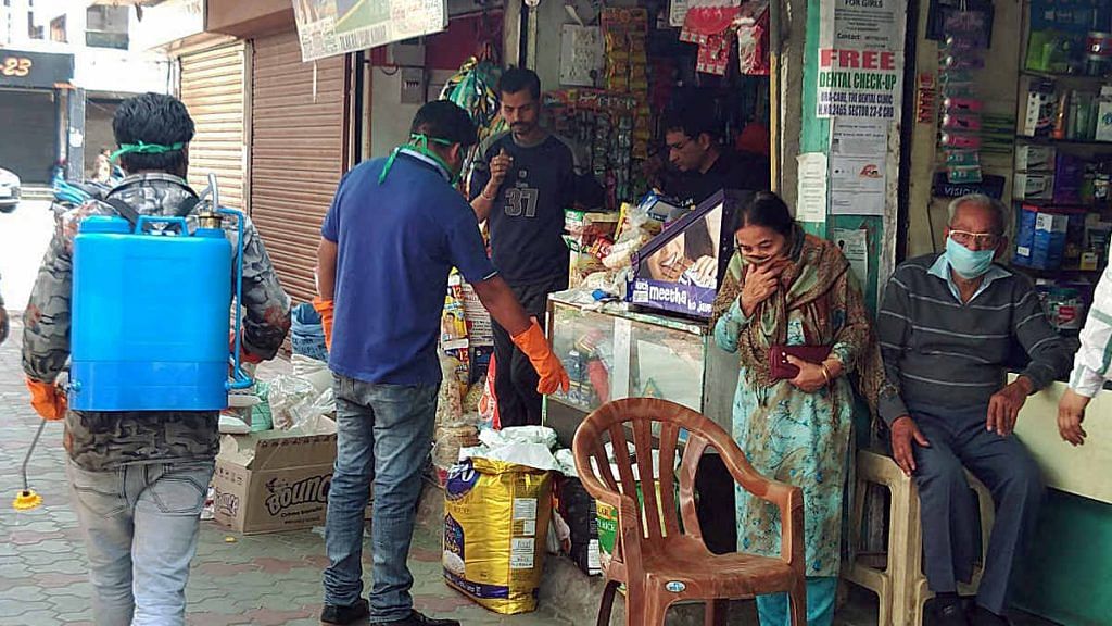 Municipal workers sanitising a market in Chandigarh, the union territory that serves as the capital of Punjab and Haryana, Saturday (representational image) | Photo: ANI
