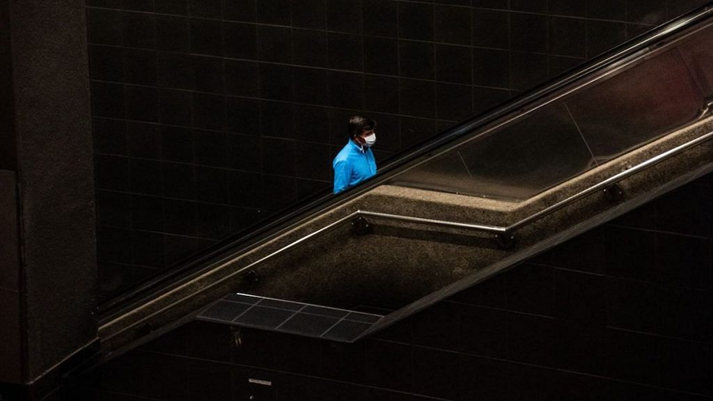 Representional image | A passenger wearing a protective mask in the Universidad de Chile subway station prior to a quarantine order in Santiago | Cristobal Olivares/Bloomberg