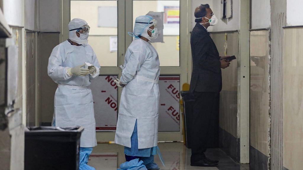 Medics wearing protective masks inside the novel coronavirus isolation ward of Government Medical College Hospital in Jammu | PTI