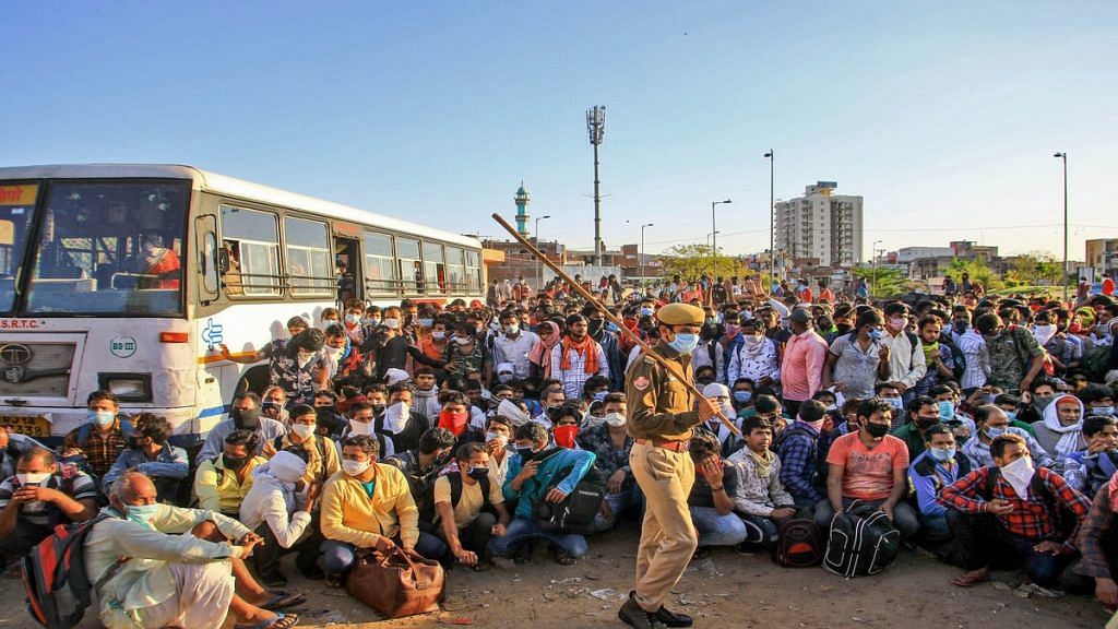 A file photo of migrant labourers gathered at a bus stand in Jaipur | PTI