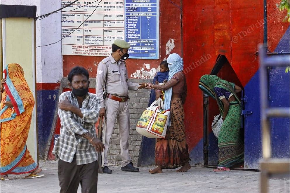 Prisoners walk out of Agra district jail Sunday