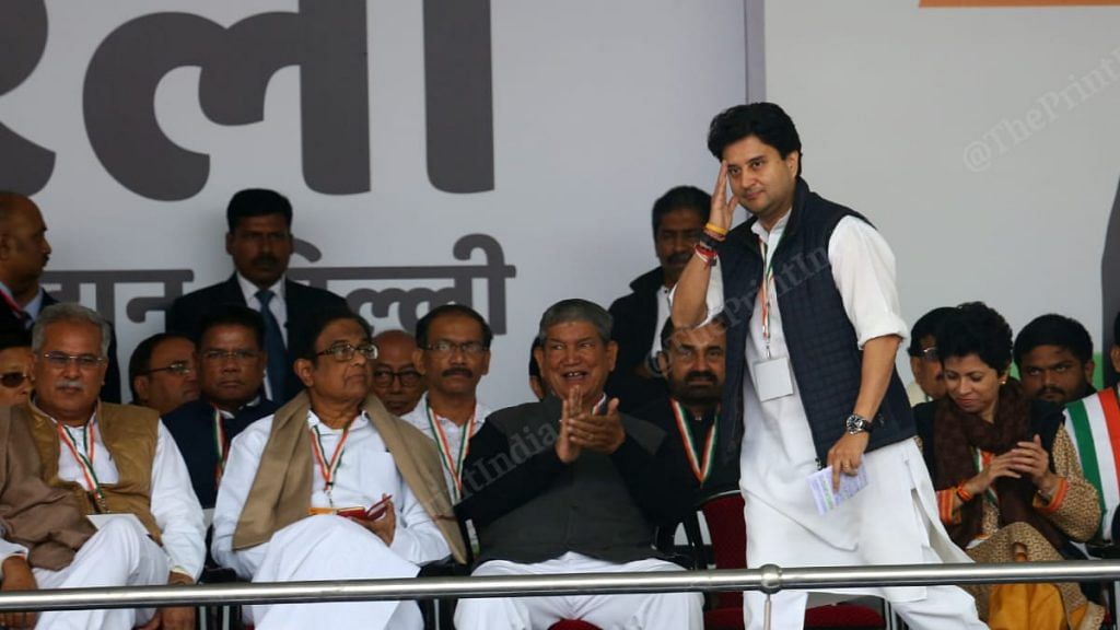 Jyotiraditya Scindia salutes the crowd before speaking at a Congress rally | Suraj Singh Bisht | ThePrint File Photo
