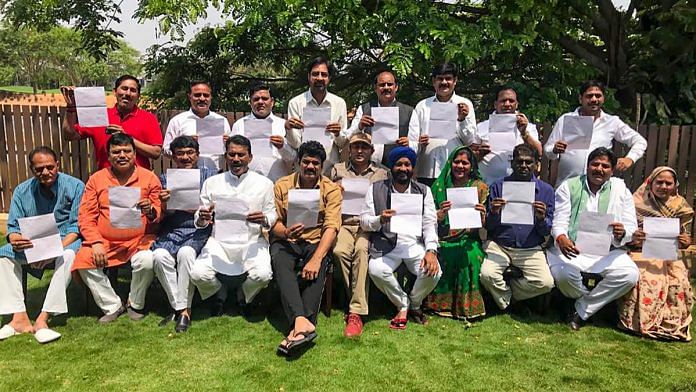 Rebel Congress MLAs flash their resignation letters in Bengaluru