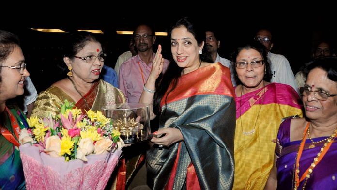 Rashmi Thackeray (centre, hand raised) during a during 'Marathi Language Day' programme in Mumbai | ANI File Photo