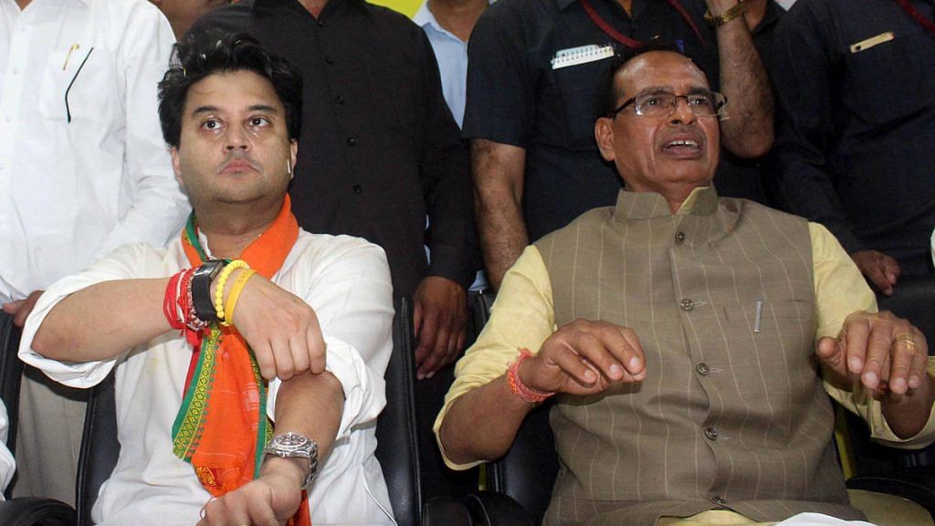 BJP leaders Jyotiraditya Scindia (left) and Shivraj Singh Chouhan at an event in Bhopal Thursday | Photo: ANI