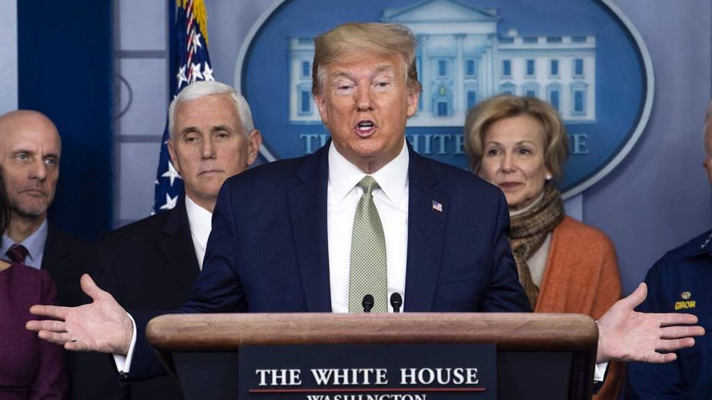 US President Donald Trump, with Anthony Fauci and Deborah Birx, speaks during a Coronavirus Task Force news conference in the briefing room of the White House in Washington, D.C. | Photographer Kevin Dietsch/UPI/Bloomberg