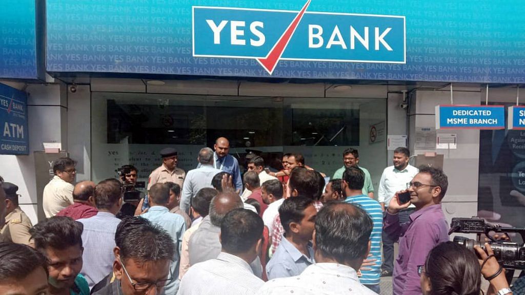 Account holders stand in a queue to withdraw money from Yes Bank at Bandra, Mumbai, Friday | Photo: ANI