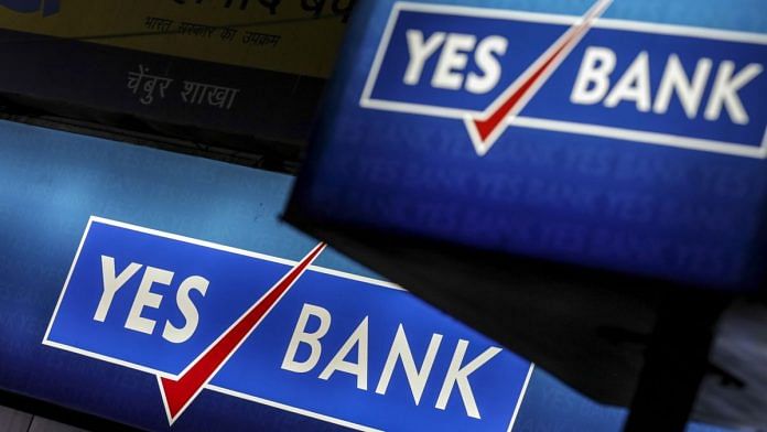 File photo of signage for Yes Bank Ltd. at a branch in Mumbai