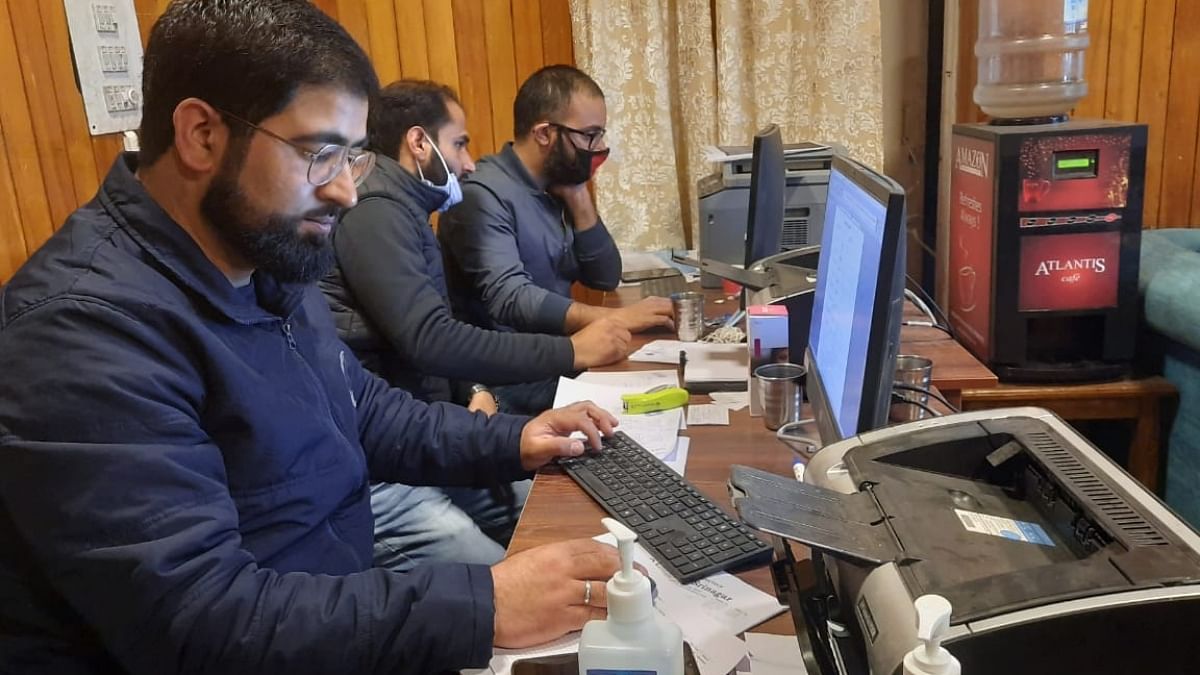 Officials working at the Srinagar control room