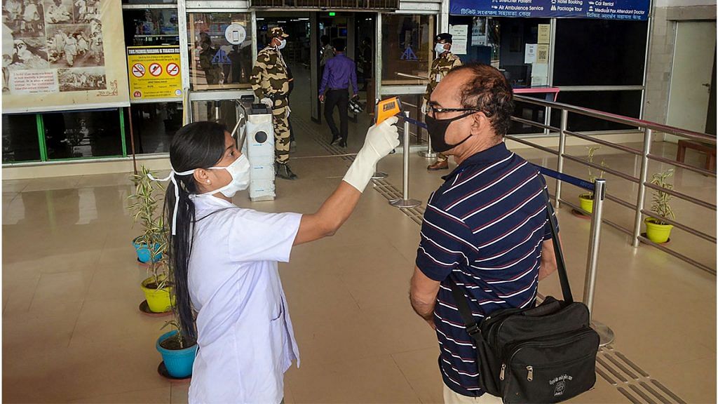 Thermal screening of passengers at MBB airport in Agartala | PTI