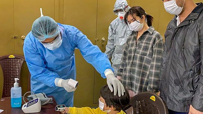 In this handout photo provided by ITBP, a Chinese boy undergoes screening tests for the deadly novel coronavirus at an ITBP quarantine facility in Chhawla, New Delhi. | PTI