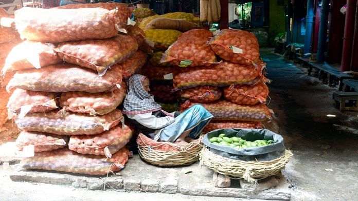 Vendor with potato sacks. | ANI