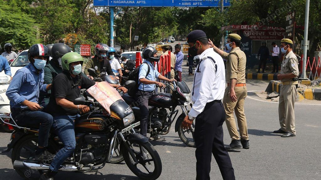 Police stops lockdown violators in Delhi | Photo: Suraj Singh Bisht | ThePrint