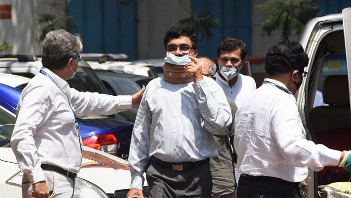 Anand Teltumbde arrives to surrender before the NIA on 14 April in Mumbai | Photo: PTI