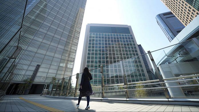 Representational image. A morning commuter walks in the Shiodome business area in Tokyo, Japan. (Representational Image) | Photographer: Toru Hanai | Bloomberg