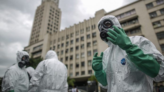Brazil's Marine Corps soldiers from the Nuclear, Biological, Chemical and Radiological Defense Company perform disinfection operations at Tram (VLT) stations in downtown Rio de Janeiro, Brazil. (Representational Image) | Photographer: Andre Coelho | Bloomberg