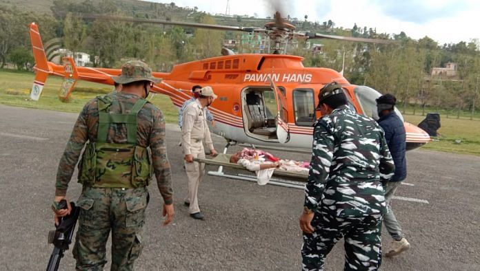 CRPF officials airlifted Mohammad Arif's father, Wazir Hussain, to a hospital in Jammu | Photo: CRPF Madadgaar on Twitter