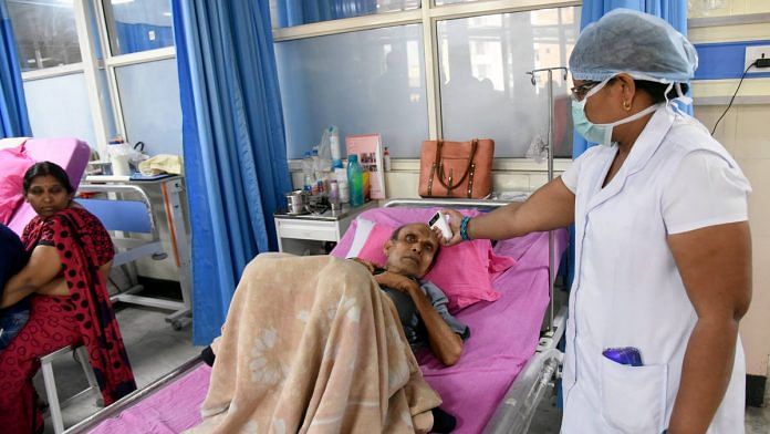 A nurse uses a thermal screening device on a patient in Patna (representational image) | Photo: ANI