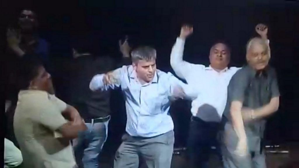 A screengrab from the viral video purportedly showing advocate Pratap Singh (centre) dancing to 'Disco dancer'. The lawyer has denied it's him in the video | By special arrangement