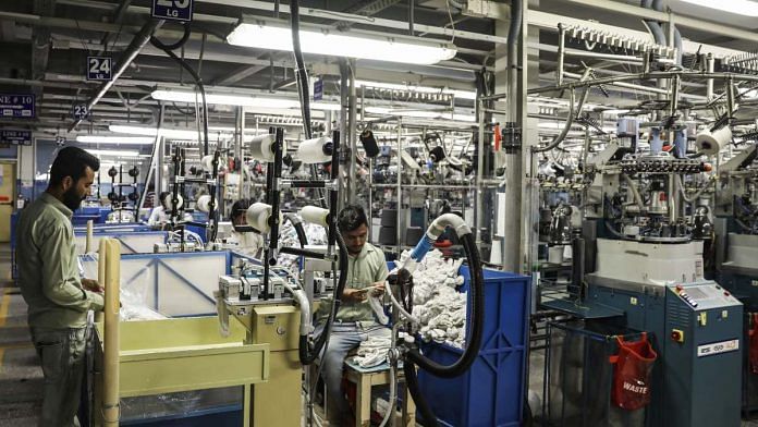 Employees operate machinery inside an Interloop facility in Faisalabad in Pakistan (Representational image) | Bloomberg