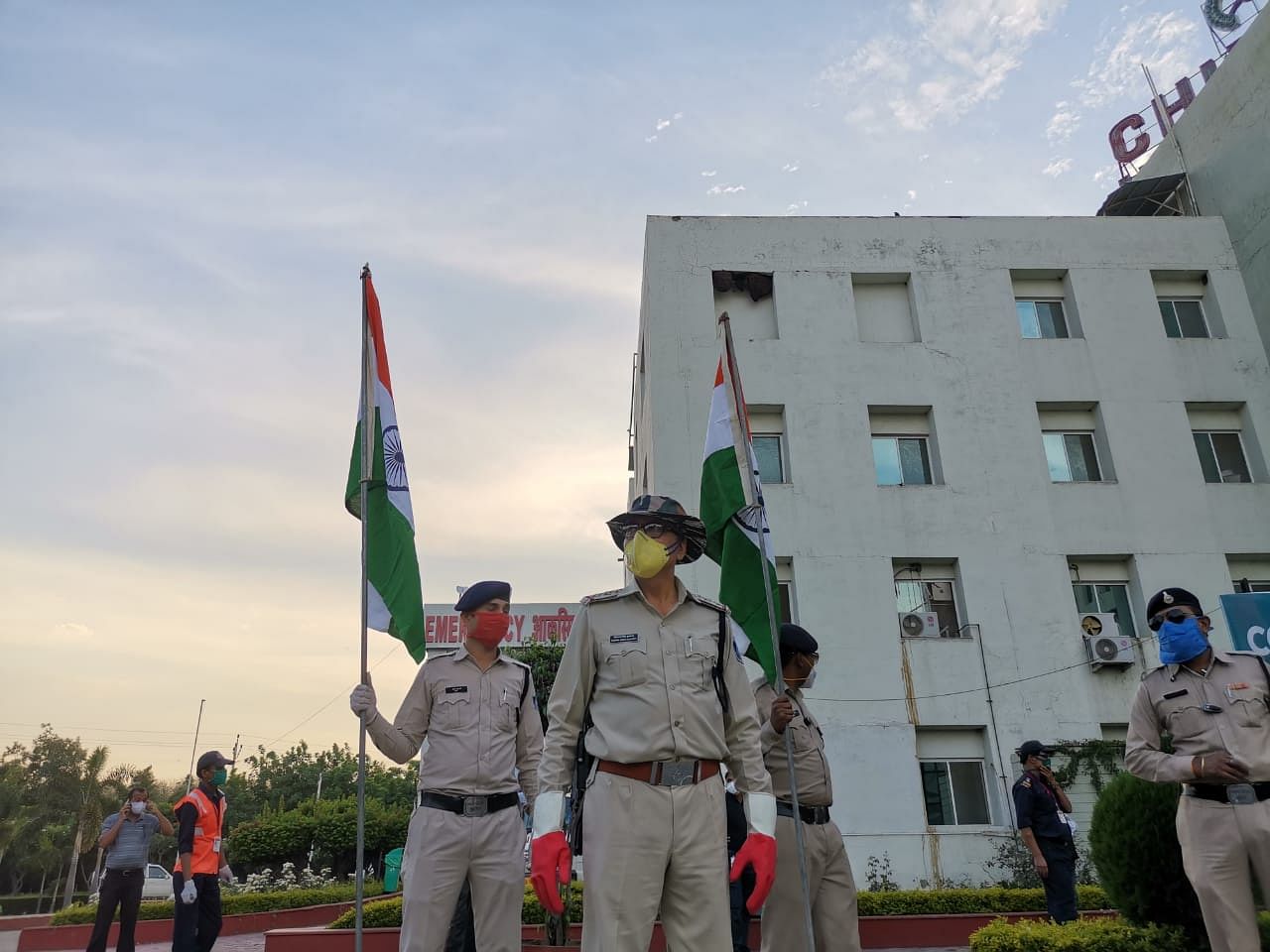Policemen hold flags as the ceremony gets underway | Angana Chakrabarti | ThePrint