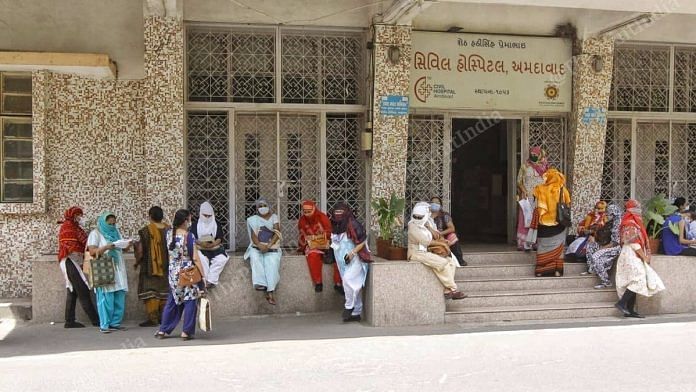 People wait at the Ahmedabad Civil Hospital | Praveen Jain | ThePrint