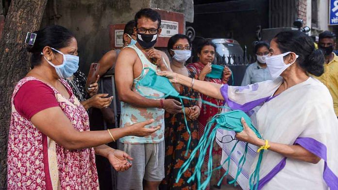 West Bengal CM Mamata Banerjee distributes masks around Kolkata Friday