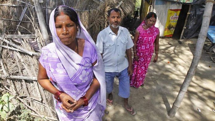 Meera Devi (front) of the Nishad community outside Ayodhya has given shelter to Ram Krishan Maurya and his wife Ila during the lockdown | Photo: Praveen Jain | ThePrint
