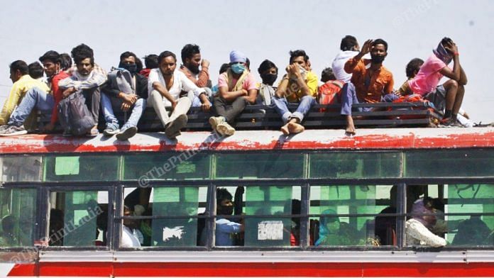 Migrant workers go home on NH2 highway | Praveen Jain | ThePrint