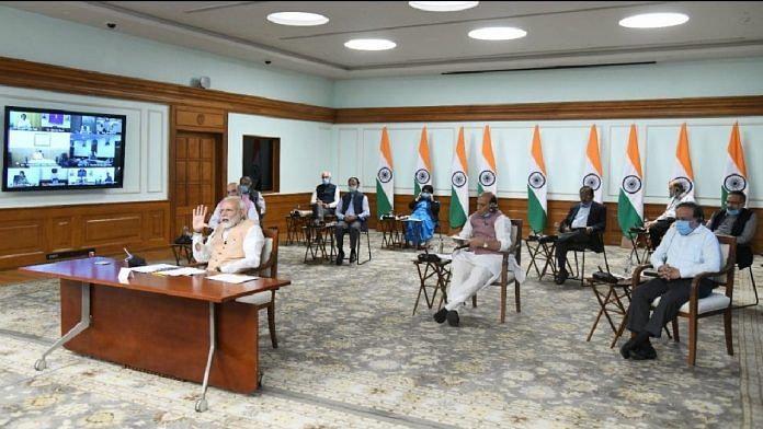 Prime Minister Narendra Modi interacts with Central ministers via video conference to ensure social distancing, on 6 April | PIB | Twitter