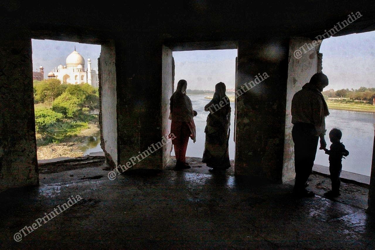 People look at Taj Mahal from Agah Khan Haveli | Photo: Praveen Jain | ThePrint