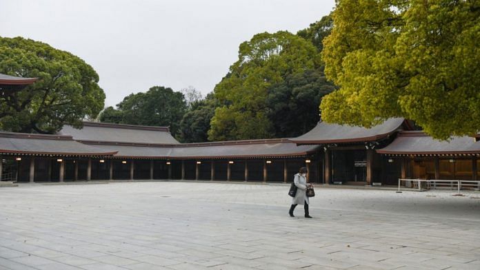 A pedestrian walks in the empty Meiji shrine in Tokyo, March 28. | Representative image | Bloomberg