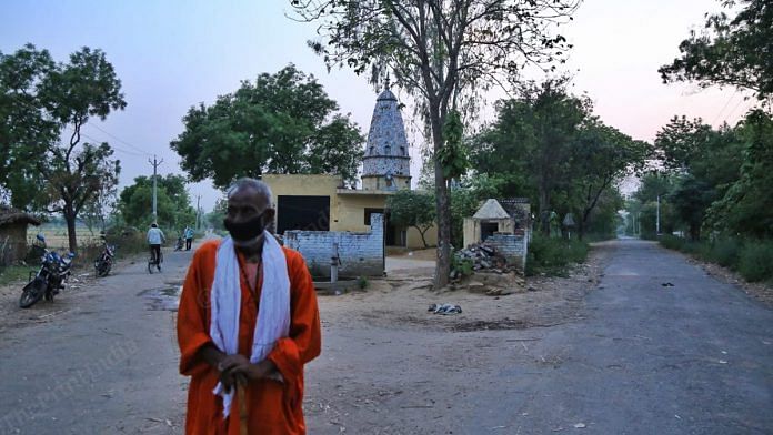 A sadhu in front of the Shiva temple at Pagona village in Bulandshahr where two priests were murdered | Photo: Manisha Mondal | ThePrint