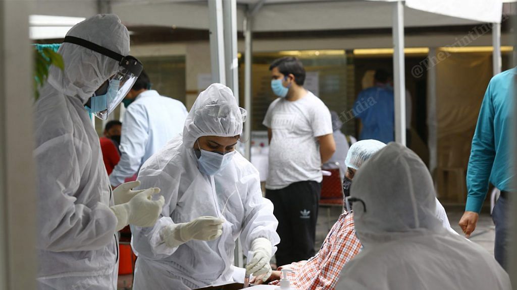 Medical workers collecting samples for COVID-19 at the centre set up for the mediapersons in New Delhi Thursday | Photo: Suraj Singh Bisht | ThePrint