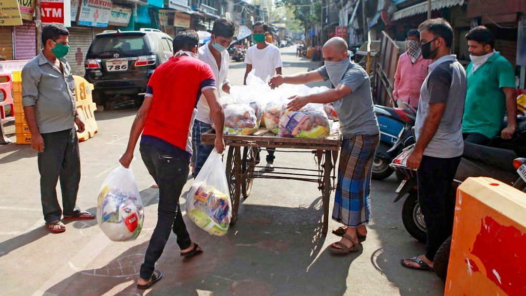 People distributing essential items in Worli, Mumbai | Photo: Ashish Raje/ANI