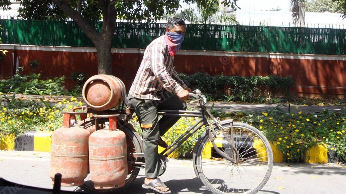 A man delivering gas cylinders during the nationwide coronavirus lockdown (Representational Image) | Photo: Praveen Jain | ThePrint