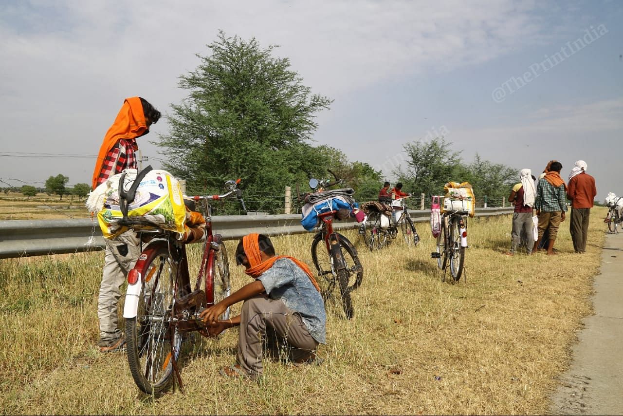 A group of men with their bicycles on the way to Uttar Pradesh. | Photo: Suraj Singh Bisht/ThePrint
