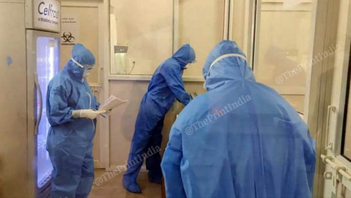 Scientists and technicians in hazmat suits at the Covid-19 testing lab at Delhi's Lady Hardinge Medical College | Photo: Angana Chakrabarti & Bismee Taskin | ThePrint