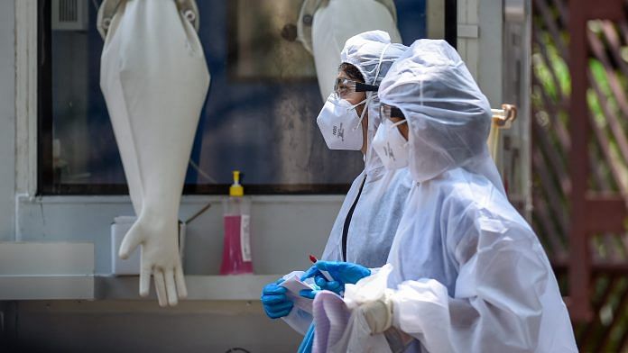 Medics walk past a new swab testing cabin at Podar hospital in Worli during a nationwide lockdown in the wake of coronavirus pandemic ( Represenational image) | PTI